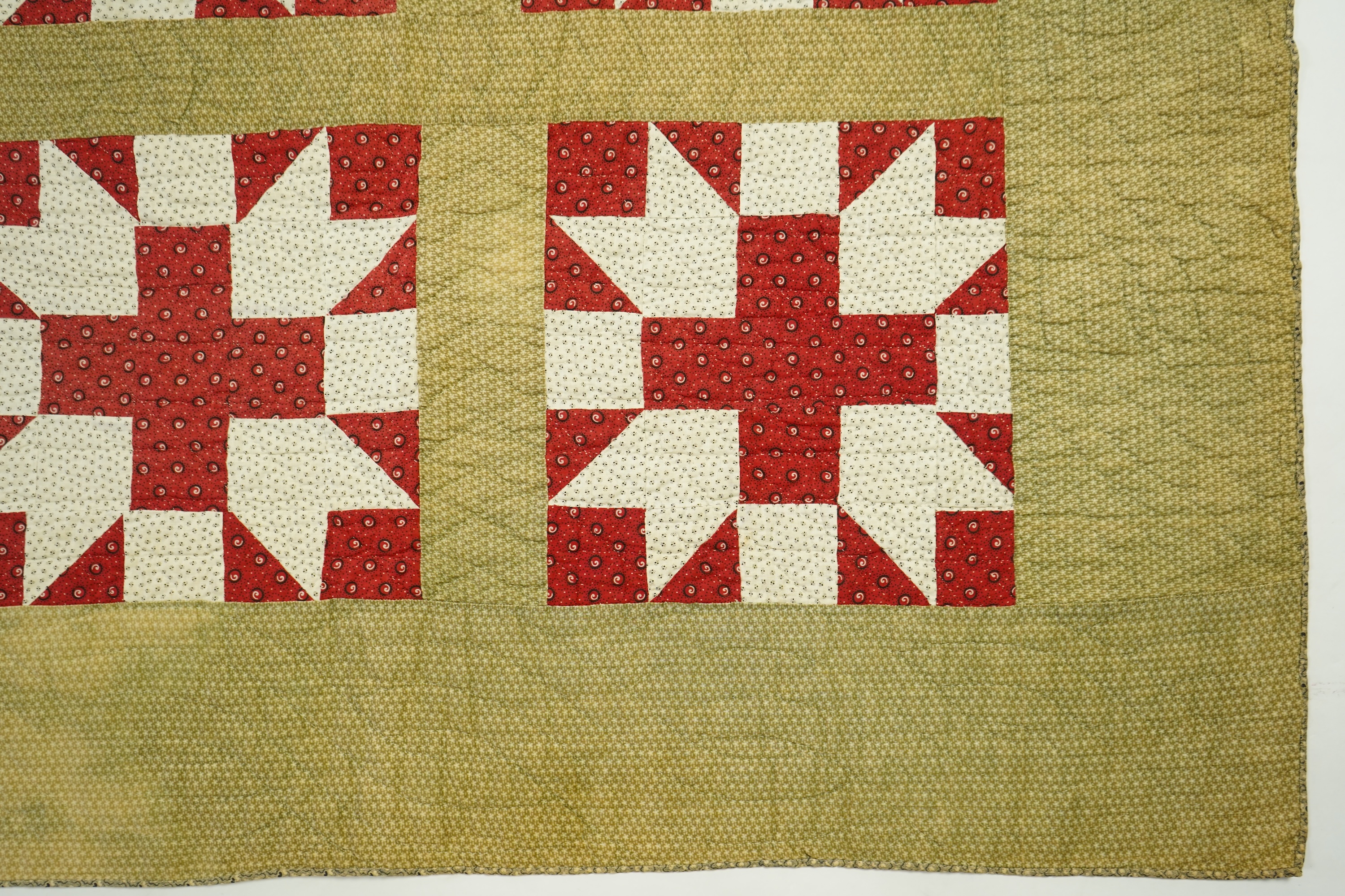 A late 19th century American, York County patchwork quilt, a similar pattern to Wild Goose Chase. Hand pieced and hand quilted, with label on reverse: York County Quilt documentation Project. G 53-2. The front worked in
